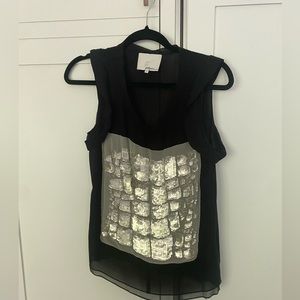 Phillip Lim blouse. It has sequin embellishment with a scoop neckline.